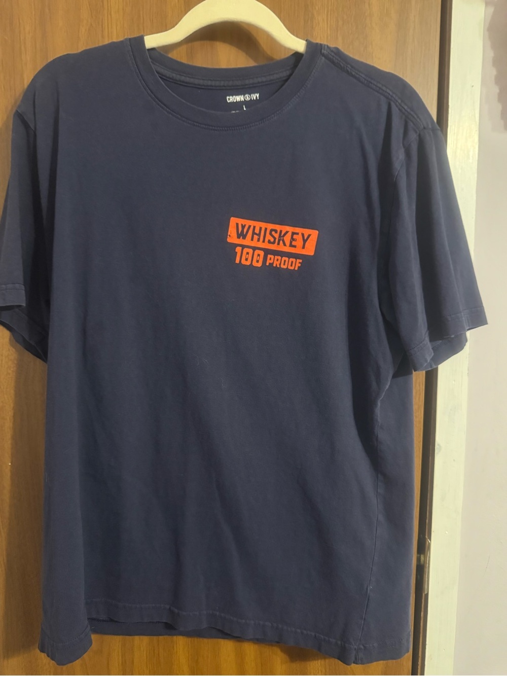 crown & ivy navy tee with orange 'Whiskey 100 Proof' chest graphic
